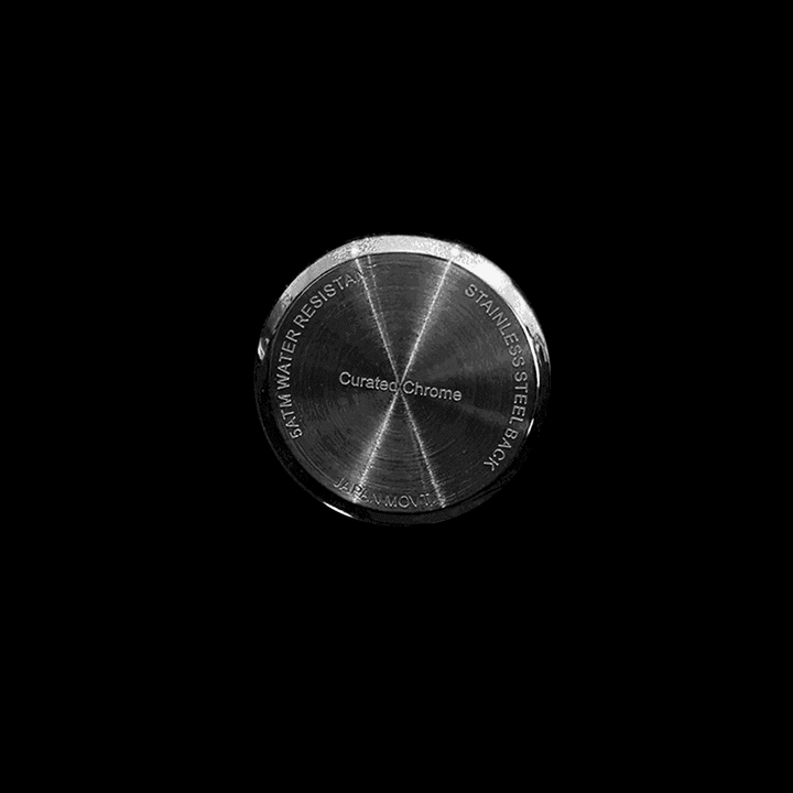 Back view of RUBY stainless steel watch showing engraved caseback with 50m water resistance and brand details.