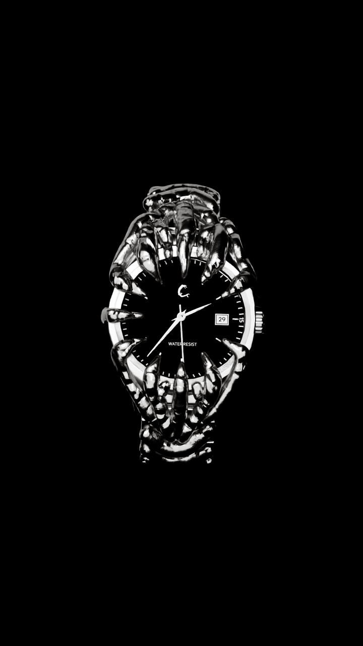 ABYSS Chrome Watch in full frontal view with skeletal chrome claws encasing the dial, blending bold design with functional elegance.