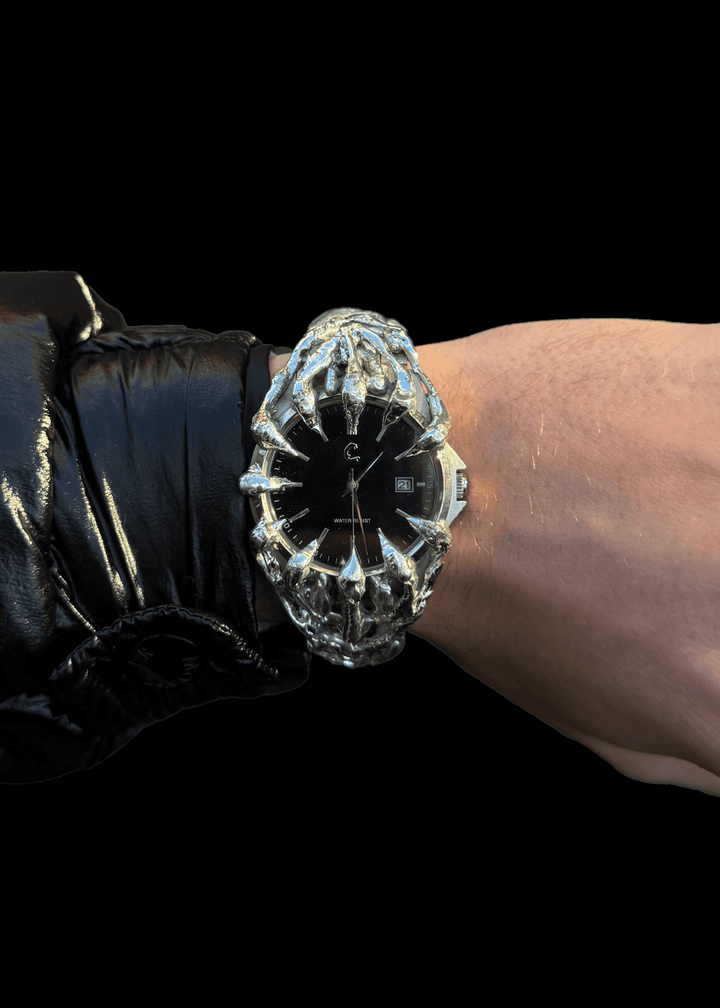 Front wrist view of ABYSS Chrome Watch, featuring aggressive skeletal chrome design and durable sapphire glass over a black dial.