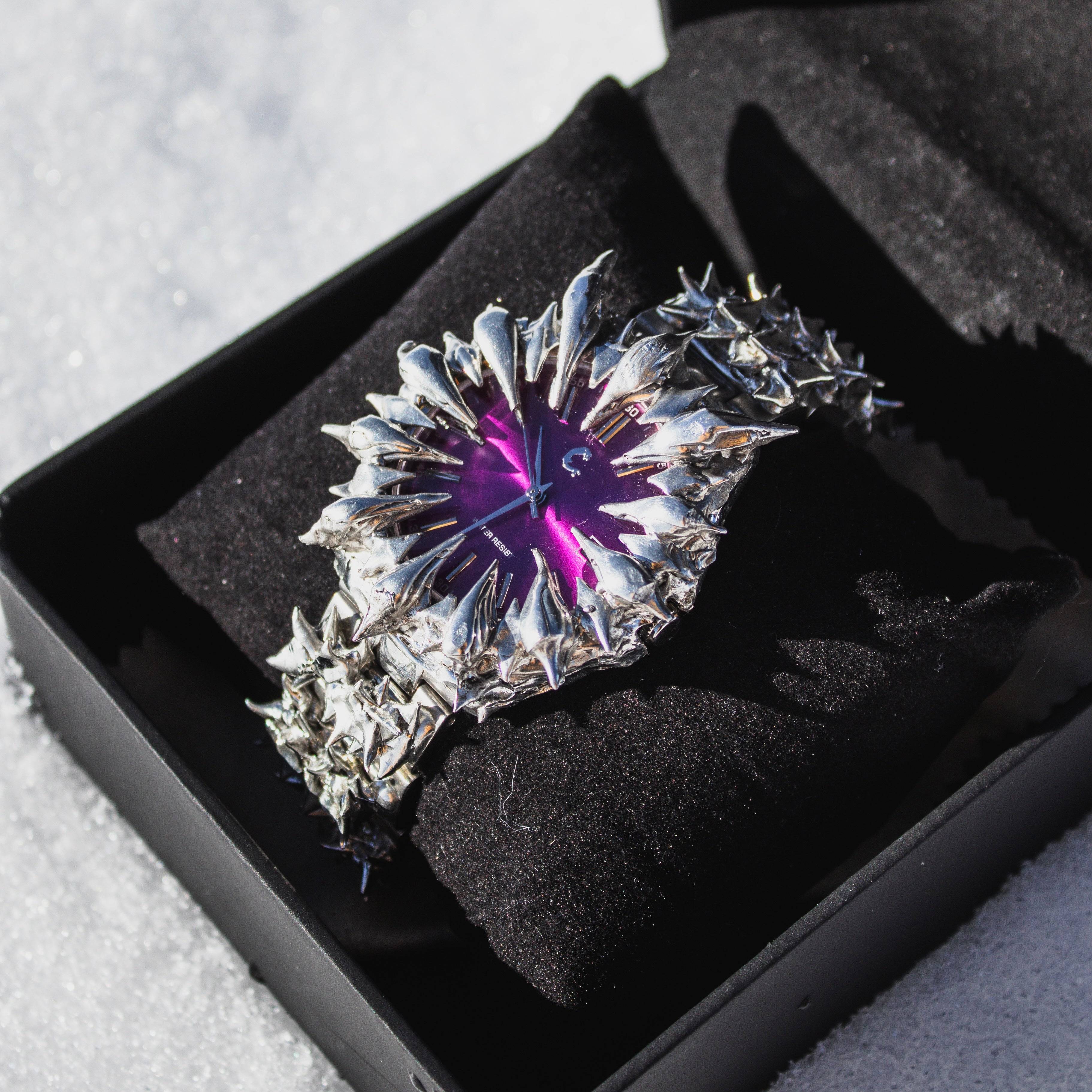 AMETHYST THORN watch in black display box, featuring a radiant purple face and aggressive silver spike detailing on the band.