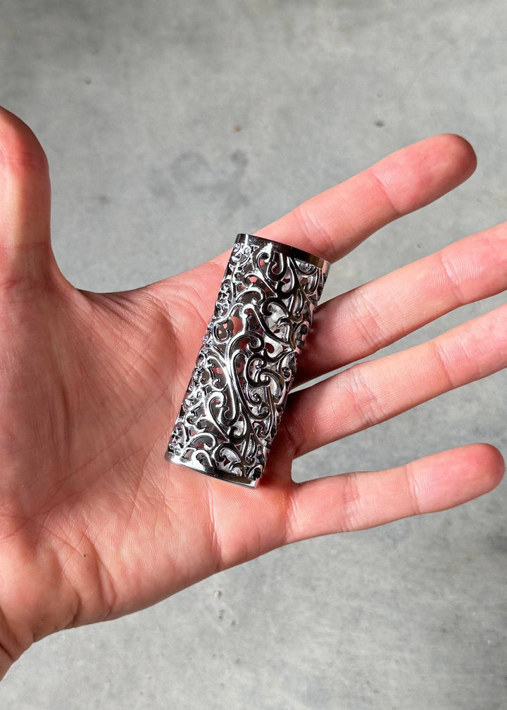Silver Scrolls Case - Polished Silver Scroll lighter case displayed in hand to show compact size and detailed craftsmanship.