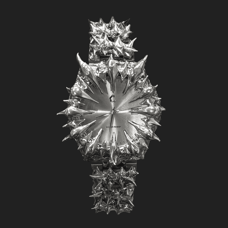Crystal Spire - Spiked Watch in chrome with quartz movement and stainless steel band, featuring a bold spiked bezel and dial design.