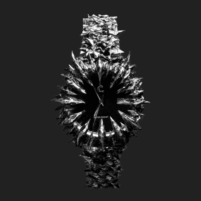 MIDNIGHT THORN spiked watch with chrome finish and black sunburst dial, featuring aggressive spike design and quartz movement for bold style.