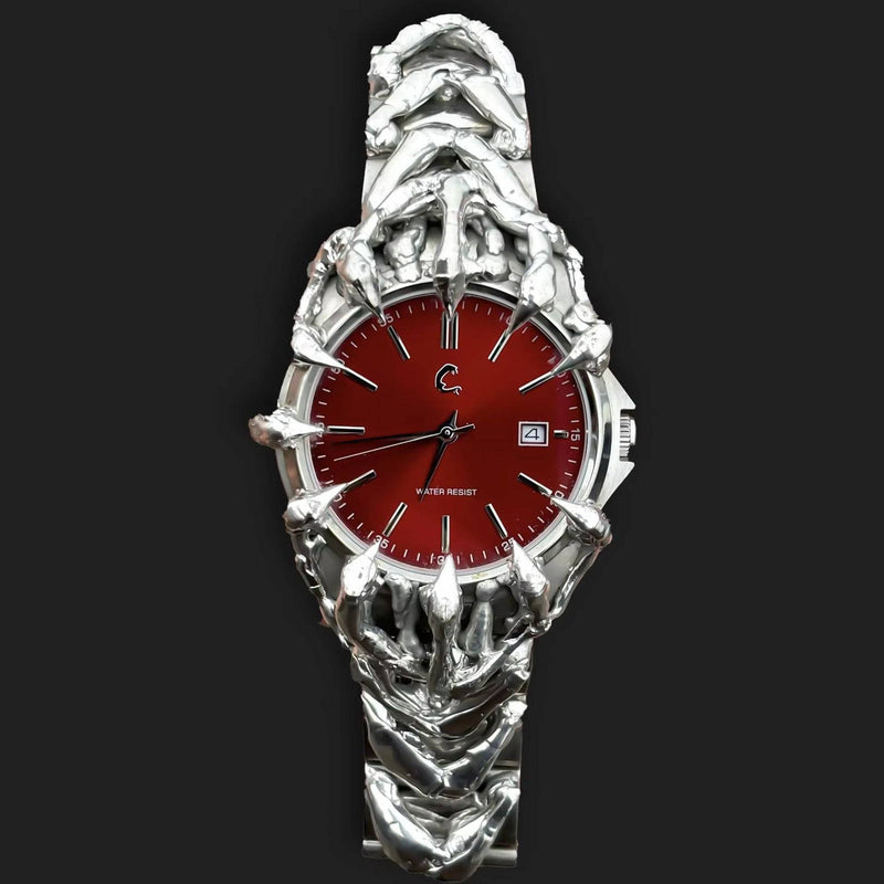BLOODFANG chrome watch with skeletal claw design and red sunburst dial, featuring water-resistant sapphire glass and Japan Quartz Movement.